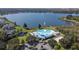 Aerial image of the community pool showcasing multiple pools and large deck at 9709 Bay Colony Dr, Riverview, FL 33578