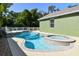 Outdoor swimming pool and spa at 9709 Bay Colony Dr, Riverview, FL 33578