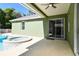 Covered patio showing view of the pool and spa at 9709 Bay Colony Dr, Riverview, FL 33578