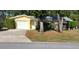 Charming single-story home with well-maintained lawn and landscaping at 9805 110Th Ln, Seminole, FL 33772