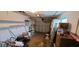 Spacious garage interior with ample storage, shelving, and convenient garage door access at 9805 110Th Ln, Seminole, FL 33772