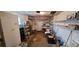 This is a full garage view with shelving units and ample storage space at 9805 110Th Ln, Seminole, FL 33772
