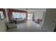 Bright living room with tile flooring and natural light at 9805 110Th Ln, Seminole, FL 33772