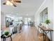 Open-concept living space seamlessly blends the living room, kitchen, and dining area, creating an inviting atmosphere at 9929 Bay Dr, Gibsonton, FL 33534