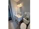 Bathroom featuring a white vanity and framed mirror at 10169 45Th N St, Pinellas Park, FL 33782
