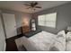 Well-lit bedroom with nice decor, a window, and comfortable bed at 10169 45Th N St, Pinellas Park, FL 33782