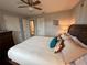 Cozy bedroom featuring a plush bed with decorative pillows at 10169 45Th N St, Pinellas Park, FL 33782