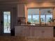 Beautiful kitchen showcasing granite countertops and stainless steel fixtures at 10169 45Th N St, Pinellas Park, FL 33782