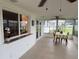 Cozy sunroom with tile flooring and plenty of natural light at 10169 45Th N St, Pinellas Park, FL 33782