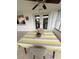 Bright sunroom with double doors and a neutral color scheme at 10169 45Th N St, Pinellas Park, FL 33782