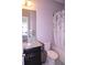 Cozy bathroom featuring a shower-tub combo and granite countertop sink at 10431 Alcon Blue Dr, Riverview, FL 33578