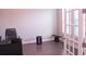 Home office with desk and chair and a French style door at 10431 Alcon Blue Dr, Riverview, FL 33578