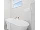 Beautiful bathroom featuring a standalone tub and tile flooring at 1052 55Th N Ave, St Petersburg, FL 33703