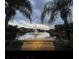 Cory Lake Drive entrance with water feature and lush landscaping at 10532 Cory Lake Dr, Tampa, FL 33647