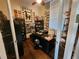 An office space with hardwood floors and built-in shelving at 10532 Cory Lake Dr, Tampa, FL 33647