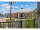 Stylish poolside pavilion offers shaded seating, ceiling fans, and pleasant views at 10945 High Noon Trl, Parrish, FL 34219