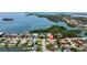 Wide aerial view of a coastal community, highlighting waterfront properties and convenient access to water activities at 1156 2Nd S Ave, Tierra Verde, FL 33715