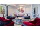 An elegant living room with recessed lighting, modern furniture, and decorative wall art at 1156 2Nd S Ave, Tierra Verde, FL 33715