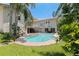 Backyard pool and spa with a spacious patio area perfect for outdoor entertaining at 1156 2Nd S Ave, Tierra Verde, FL 33715