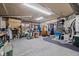 Large workshop area with lots of tools, storage, and workbench space, ideal for DIY projects at 1156 2Nd S Ave, Tierra Verde, FL 33715