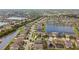 Picturesque aerial view of a sprawling neighborhood featuring multiple ponds and lush greenery at 11602 Sunburst Marble Rd, Riverview, FL 33579