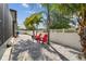 Spacious backyard featuring a paved patio, perfect for outdoor seating and enjoying the beautiful weather at 11602 Sunburst Marble Rd, Riverview, FL 33579