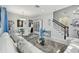 Bright and airy living room and dining area with stylish furnishings and decor at 11602 Sunburst Marble Rd, Riverview, FL 33579