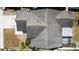 An aerial view of a well-maintained roof of a residential home with a patio at 11641 Branch Mooring Dr, Tampa, FL 33635