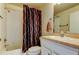 Bathroom featuring a shower-tub combination and a vanity with sink at 11641 Branch Mooring Dr, Tampa, FL 33635