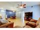 Spacious living room with a ceiling fan, and a dining area at 11641 Branch Mooring Dr, Tampa, FL 33635