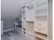 Walk-in closet with custom shelving and storage systems, creating ample and organized space at 120 1St E St # 109, Tierra Verde, FL 33715