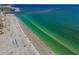 Expansive beach view, with ocean access and crystal blue water, perfect for relaxation at 13303 Gulf Ln, Madeira Beach, FL 33708