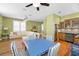 Open living room with dining area, wet bar and comfortable seating in neutral tones at 13303 Gulf Ln, Madeira Beach, FL 33708