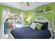 Stylized bedroom with a view of the pool area from sliding glass doors at 13810 Lake Village Pl, Tampa, FL 33618