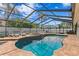 Inviting pool area with plenty of space for lounge chairs and a spa at 13810 Lake Village Pl, Tampa, FL 33618