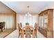 Dining room showcasing an elegant wood dining set and ornate china cabinet at 13903 Wolcott Dr, Tampa, FL 33624