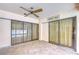 Covered patio with brick flooring and a view of the pool through sliding glass doors at 13903 Wolcott Dr, Tampa, FL 33624