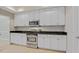 Well-equipped kitchen with stainless steel appliances, granite countertops, and abundant cabinetry at 16137 Churchview Dr, Lithia, FL 33547