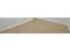 Light wood floors with white trim in a neutral colored room at 1625 39Th S St, St Petersburg, FL 33711
