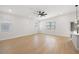 Spacious and bright living room area featuring hardwood floors and ample natural light at 1625 39Th S St, St Petersburg, FL 33711