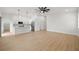 Bright and airy living room with hardwood floors, modern lighting, and an open floor plan at 1625 39Th S St, St Petersburg, FL 33711