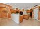A kitchen with a kitchen island, stainless steel appliances and granite countertops at 17923 Arbor Haven Dr, Tampa, FL 33647
