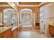 Luxurious bathroom features tiled floors, double sinks, tub, and walk-in shower at 17923 Arbor Haven Dr, Tampa, FL 33647
