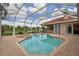 Backyard pool area featuring a swimming pool, spa, and plenty of space for outdoor entertaining at 17923 Arbor Haven Dr, Tampa, FL 33647