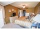 Comfortable bedroom with carpet, ceiling fan, and neutral toned walls at 1846 Golfview Dr # 1846, Tarpon Springs, FL 34689