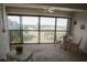 Relax on the lanai with a view of the landscaped greenery and golf course at 1846 Golfview Dr # 1846, Tarpon Springs, FL 34689