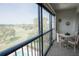 Lanai featuring views of a green golf course and sparkling community pool at 1846 Golfview Dr # 1846, Tarpon Springs, FL 34689
