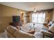 Cozy living room with large sliding glass doors leading to a balcony at 1846 Golfview Dr # 1846, Tarpon Springs, FL 34689