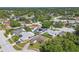 Wide aerial shot showcasing the community, homes, and lush greenery of the neighborhood at 1944 Hastings Ln, Clearwater, FL 33763