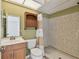 Bathroom featuring a vanity, toilet, and shower with a unique shower curtain at 1944 Hastings Ln, Clearwater, FL 33763
